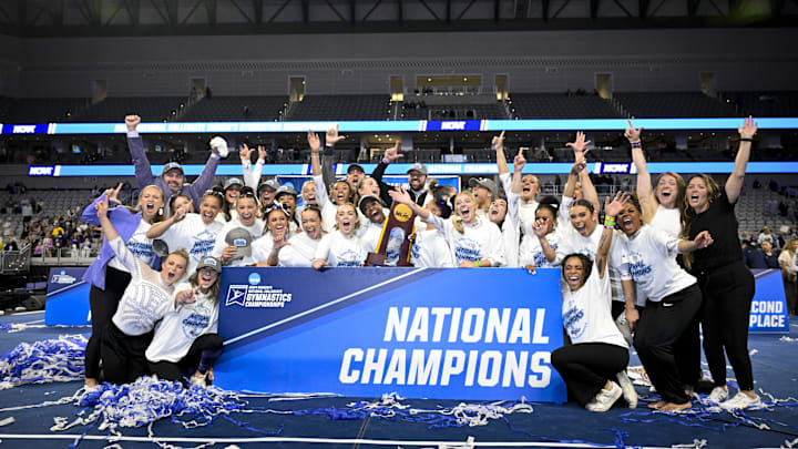 Apr 20, 2024; Fort Worth, TX, USA; The LSU Tigers gymnastics team celebrates after winning the