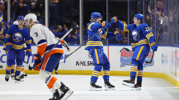 Mar 31, 2026; Buffalo, New York, USA;  Buffalo Sabres right wing Jack Quinn (22) celebrates his goal with defenseman Rasmus Dahlin (26) during the first period against the New York Islanders at KeyBank Center. Mandatory Credit: Timothy T. Ludwig-Imagn Images
