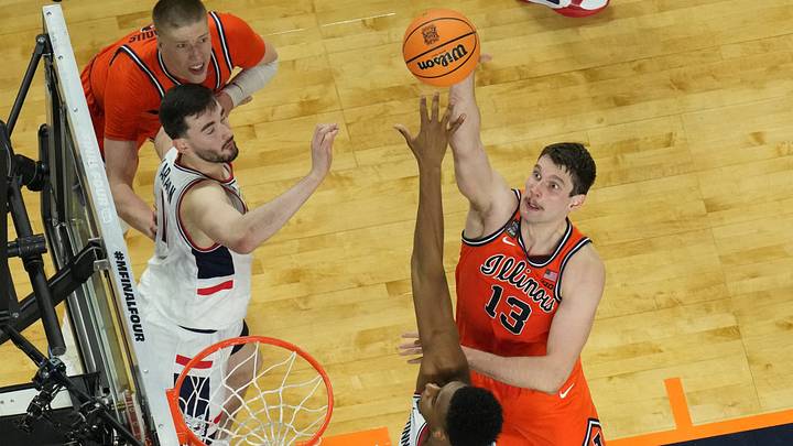 Apr 4, 2026; Indianapolis, IN, USA; Illinois Fighting Illini center Tomislav Ivisic (13) shoots against the Connecticut Huskies in the second half during a semifinal of the Final Four of the men's 2026 NCAA Tournament at Lucas Oil Stadium. Mandatory Credit: Robert Deutsch-Imagn Images Apr 4, 2026; Indianapolis, IN, USA; Illinois Fighting Illini center Tomislav Ivisic (13) shoots against the Connecticut Huskies in the second half during a semifinal of the Final Four of the men's 2026 NCAA Tournament at Lucas Oil Stadium. Mandatory Credit: Robert Deutsch-Imagn Images