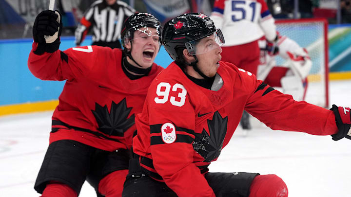 Feb 18, 2026; Milan, Italy; Mitch Marner of Canada celebrates with Macklin Celebrini after scoring their fourth goal in overtime to win the match against Czechia in a men's ice hockey quarterfinal during the Milano Cortina 2026 Olympic Winter Games at Milano Santagiulia Ice Hockey Arena. Mandatory Credit: Amber Searls-Imagn Images Feb 18, 2026; Milan, Italy; Mitch Marner of Canada celebrates with Macklin Celebrini after scoring their fourth goal in overtime to win the match against Czechia in a men's ice hockey quarterfinal during the Milano Cortina 2026 Olympic Winter Games at Milano Santagiulia Ice Hockey Arena. Mandatory Credit: Amber Searls-Imagn Images