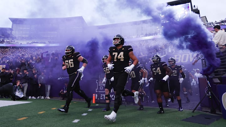 Oct 10, 2025; Seattle, Washington, USA; Washington Huskies offensive lineman Drew Azzopardi (74) enters the field before the game against the Rutgers Scarlet Knights  at Husky Stadium. Mandatory Credit: Kevin Ng-Imagn Images