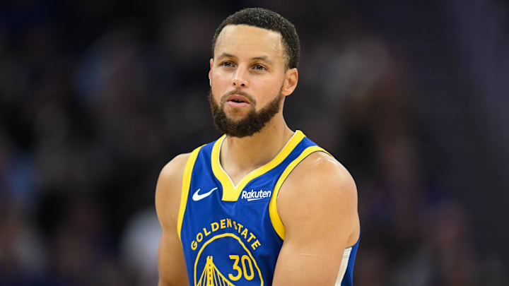 Golden State Warriors guard Stephen Curry (30) looks on against the Phoenix Suns in the second quarter at Chase Center. Golden State Warriors guard Stephen Curry (30) looks on against the Phoenix Suns in the second quarter at Chase Center.