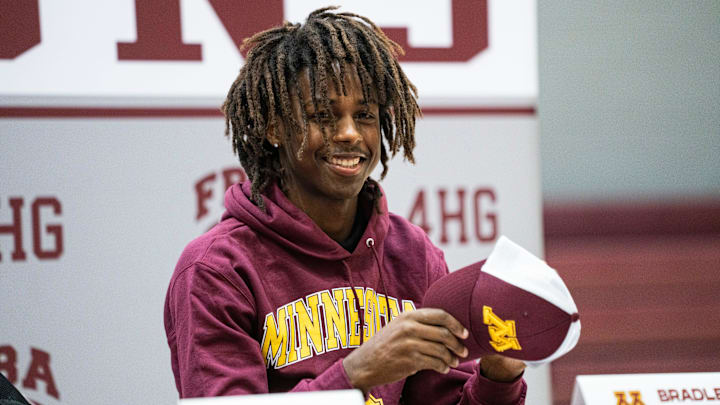 Bradley Martino smiles after signing her letter of intent to play football at the University of Minnesota during a signing day ceremony at First Baptist Academy in Naples, Fla., on Wednesday, Dec. 4, 2024.
