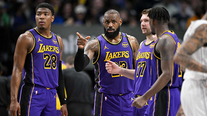 Apr 9, 2025; Dallas, Texas, USA; Los Angeles Lakers forward Rui Hachimura (28) and forward LeBron James (23) and guard Luka Doncic (77) and forward Dorian Finney-Smith (17) during the game between the Dallas Mavericks and the Los Angeles Lakers at American Airlines Center. Mandatory Credit: Jerome Miron-Imagn Images