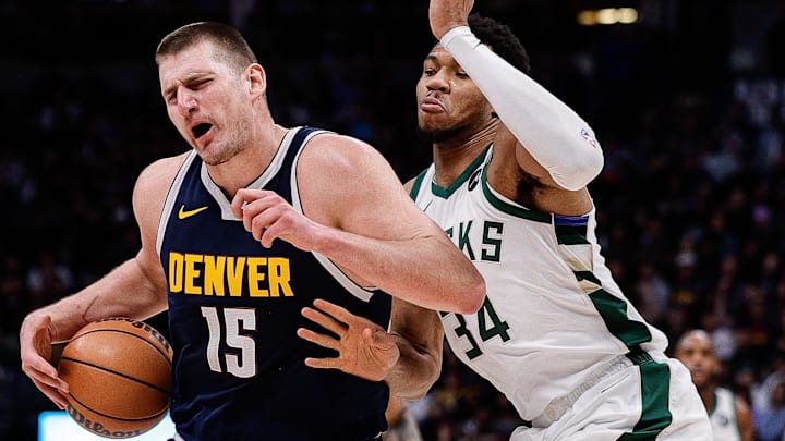 Jan 29, 2024; Denver, Colorado, USA; Denver Nuggets center Nikola Jokic (15) controls the ball against Milwaukee Bucks forward Giannis Antetokounmpo (34) in the third quarter at Ball Arena. Jan 29, 2024; Denver, Colorado, USA; Denver Nuggets center Nikola Jokic (15) controls the ball against Milwaukee Bucks forward Giannis Antetokounmpo (34) in the third quarter at Ball Arena.