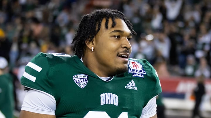Dec 30, 2022; Tucson, AZ, USA; Ohio Bobcats defensive tackle Bralen Henderson (81) against the Wyoming Cowboys during the 2022 Barstool Sports Arizona Bowl at Arizona Stadium. Mandatory Credit: Mark J. Rebilas-Imagn Images Dec 30, 2022; Tucson, AZ, USA; Ohio Bobcats defensive tackle Bralen Henderson (81) against the Wyoming Cowboys during the 2022 Barstool Sports Arizona Bowl at Arizona Stadium. Mandatory Credit: Mark J. Rebilas-Imagn Images