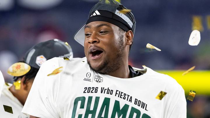 Miami Hurricanes DT Ahmad Moten Sr celebrates after defeating the Mississippi Rebels during the 2026 Fiesta Bowl. Miami Hurricanes DT Ahmad Moten Sr celebrates after defeating the Mississippi Rebels during the 2026 Fiesta Bowl.