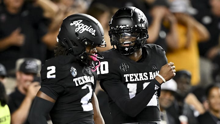 Oct 26, 2024; College Station, Texas, USA; Texas A&M Aggies quarterback Marcel Reed (10) celebrates after scoring a touchdown in the fourth quarter against the LSU Tigers at Kyle Field. Mandatory Credit: Maria Lysaker-Imagn Images. 