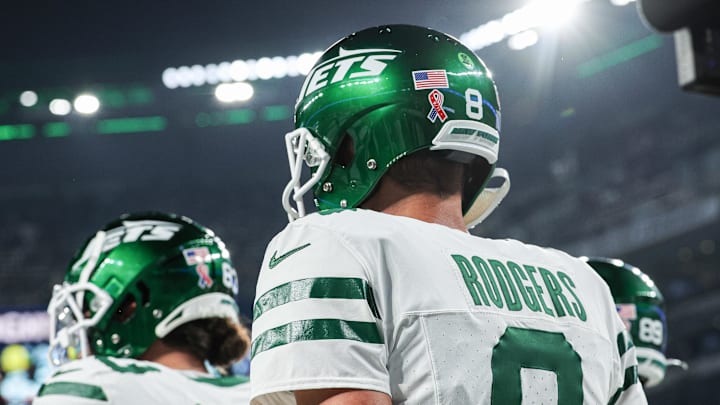 Sep 11, 2023; East Rutherford, New Jersey, USA; New York Jets quarterback Aaron Rodgers (8) walks on