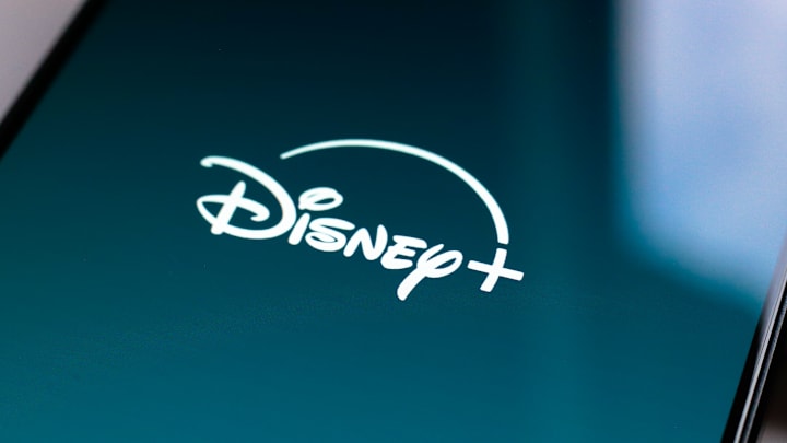 In this photo illustration, the Disney Plus streaming app...