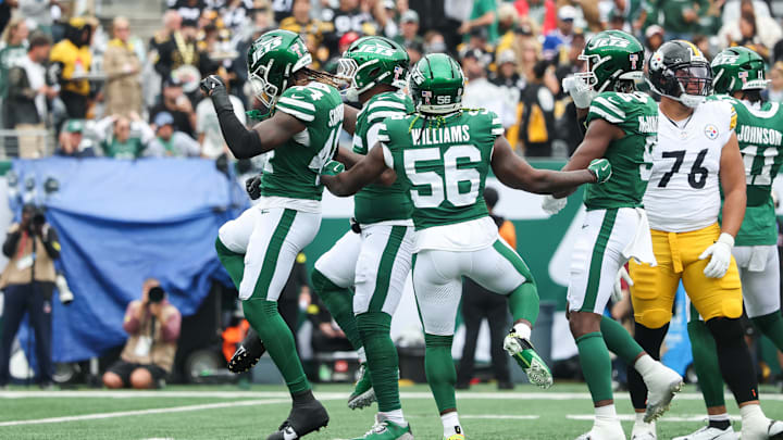 Sep 7, 2025; East Rutherford, New Jersey, USA; New York Jets linebacker Quincy Williams (56) celebrates after a play during the second half against the Pittsburgh Steelers during at MetLife Stadium. Mandatory Credit: Vincent Carchietta-Imagn Images