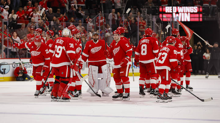 Apr 14, 2025; Detroit, Michigan, USA; The Detroit Red Wings celebrate their win over the Dallas Stars at Little Caesars Arena. Mandatory Credit: Brian Bradshaw Sevald-Imagn Images