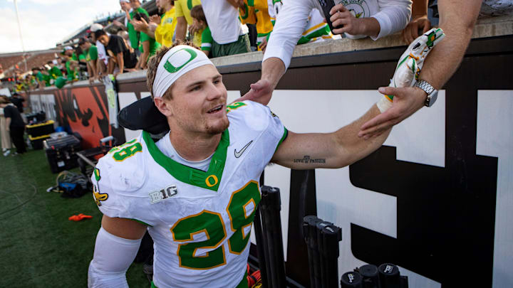 Oregon inside linebacker Bryce Boettcher celebrates with fans after the game as the Oregon State Beavers host the Oregon Ducks Saturday, Sept. 14, 2024 at Reser Stadium in Corvallis, Ore.