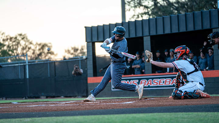 Hagerty's Max Murray Jr. takes a swing at a pitch in a game against Lake Mary. Last week, he struck out six and scattered five hits to pick up the complete game win and went 2-for-3 with one RBI at the plate to power the Huskies past Timber Creek, 6-1, in the Class 7A, District 3 championship game.