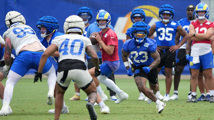 Jun 3, 2025; Woodland Hills, CA, USA; Los Angeles Rams quarterback Matthew Stafford (9) throws the ball during organized team activities at Rams Practice Facility. Mandatory Credit: Kirby Lee-Imagn Images
