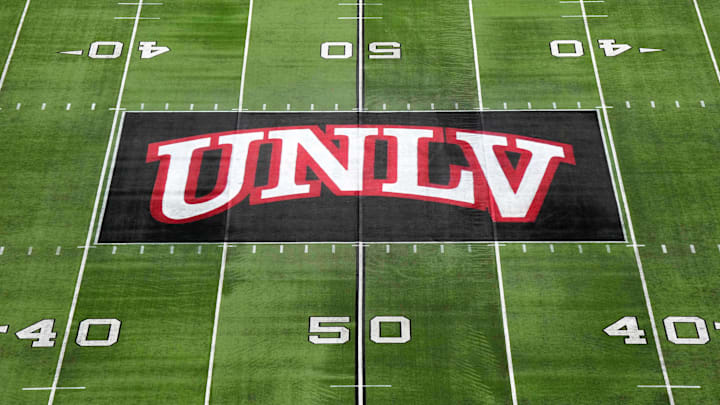 The UNLV Rebels logo at midfield during the Mountain West Championship at Allegiant Stadium. Mandatory Credit: Kirby Lee-Imagn Images