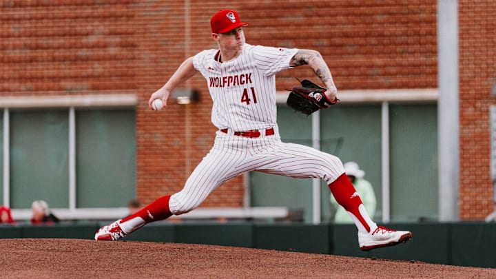 Jacob Dudan throws a pitch. Jacob Dudan throws a pitch.