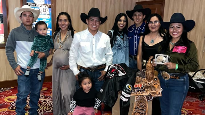 Jareth and family with her 2024 INFR All Around awards