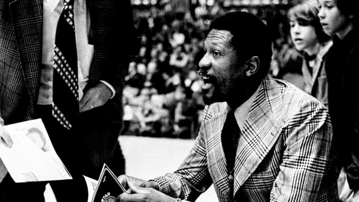 Bill Russell, right, head coach and general manager of the Seattle Supersonics, waits to coach the Pacific-8 against the SEC in the first round of the first annual Four-Star Classic at Vanderbilt University’s Memorial Gym on April 9, 1974.