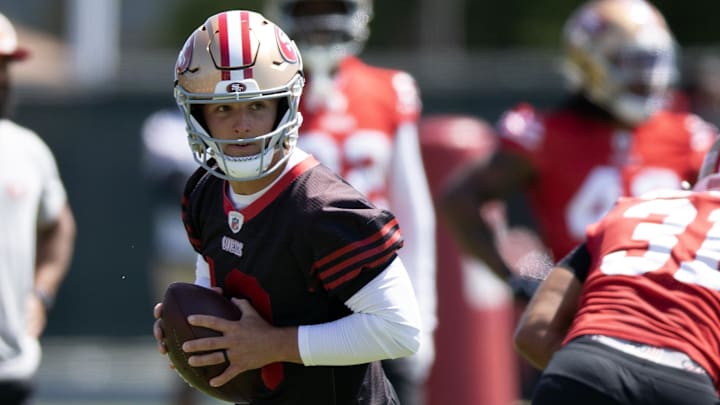 Jun 11, 2025; Santa Clara, CA, USA; San Francisco 49ers quarterback Brock Purdy (13) rolls out to pass during a team OTA at Levi's Stadium. Mandatory Credit: D. Ross Cameron-Imagn Images