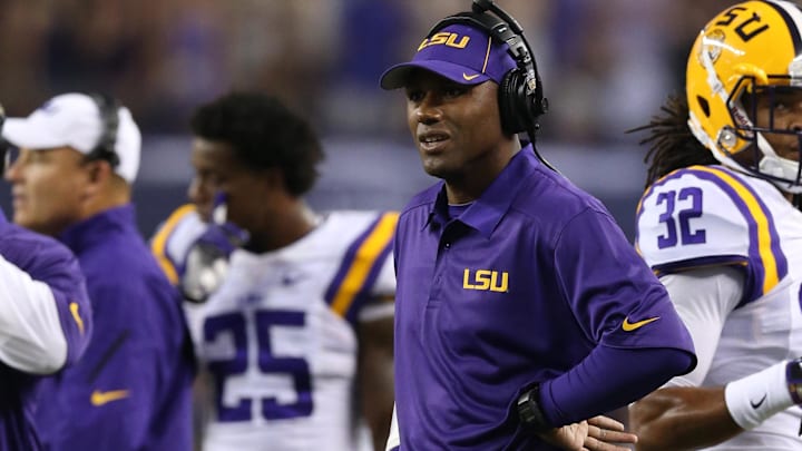 Aug 31, 2013; Arlington, TX, USA; LSU Tigers defensive backs coach Corey Raymond on the sidelines during the game against the Texas Christian Horned Frogs at AT&T Stadium. Mandatory Credit: Matthew Emmons-USA TODAY Sports