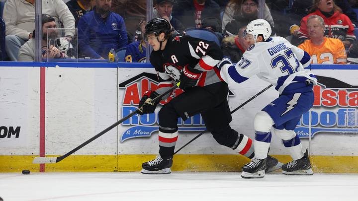 Buffalo Sabres center Tage Thompson (72) goes after a loose puck as Tampa Bay Lightning center Yanni Gourde (37) defends during the third period at KeyBank Center. Mandatory Credit: Timothy T. Ludwig-Imagn Images Buffalo Sabres center Tage Thompson (72) goes after a loose puck as Tampa Bay Lightning center Yanni Gourde (37) defends during the third period at KeyBank Center. Mandatory Credit: Timothy T. Ludwig-Imagn Images