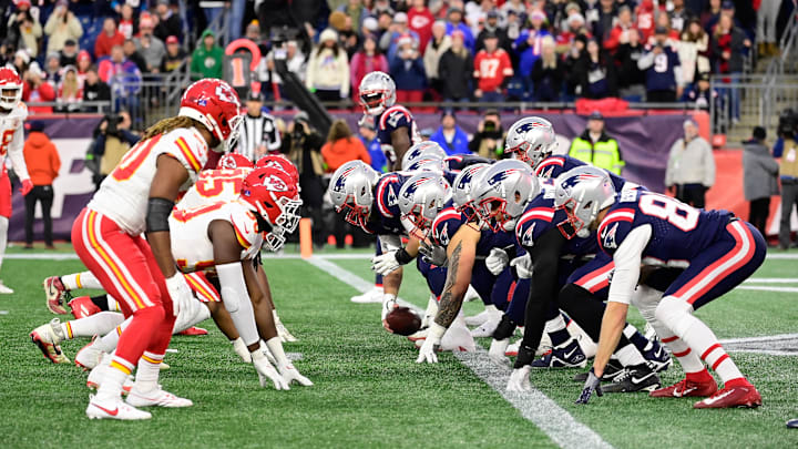 Dec 17, 2023; Foxborough, Massachusetts, USA; The New England Patriots offensive line and Kansas City Chiefs defense battle over the line of scrimmage during the second half at Gillette Stadium. Mandatory Credit: Eric Canha-Imagn Images