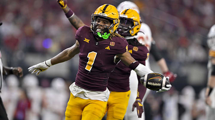 Dec 7, 2024; Arlington, TX, USA; Arizona State Sun Devils defensive back Keith Abney II (1) and defensive back Shamari Simmons (7) celebrate during the game between the Iowa State Cyclones and the Arizona State Sun Devils at AT&T Stadium. Mandatory Credit: Jerome Miron-Imagn Images
