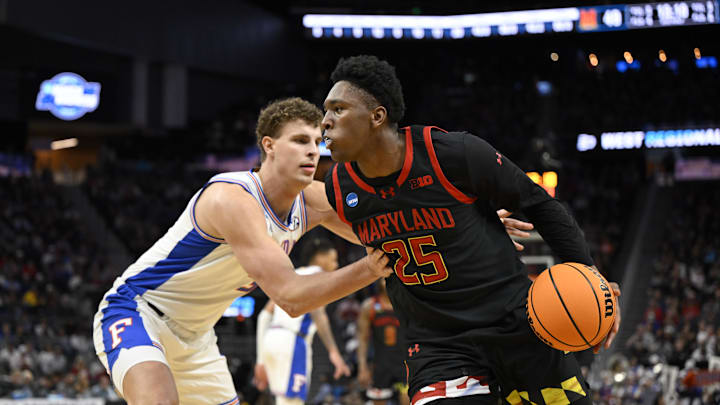 Mar 27, 2025; San Francisco, CA, USA; Maryland Terrapins center Derik Queen (25) drives to the hoop past Florida Gators center Micah Handlogten (3) during the second half during a West Regional semifinal of the 2025 NCAA tournament at Chase Center. Mandatory Credit: Eakin Howard-Imagn Images Mar 27, 2025; San Francisco, CA, USA; Maryland Terrapins center Derik Queen (25) drives to the hoop past Florida Gators center Micah Handlogten (3) during the second half during a West Regional semifinal of the 2025 NCAA tournament at Chase Center. Mandatory Credit: Eakin Howard-Imagn Images