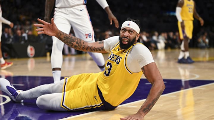 Nov 8, 2024; Los Angeles, California, USA; Los Angeles Lakers forward Anthony Davis (3) reacts after being fouled against the Philadelphia 76ers during the second half at Crypto.com Arena. Mandatory Credit: Jonathan Hui-Imagn Images