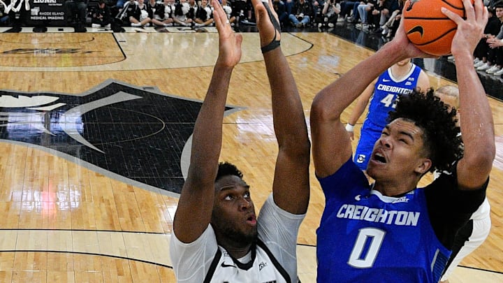 Creighton Bluejays forward Jasen Green (0) shoots the ball against Providence Friars forward Oswin Erhunmwunse (55) during the second half at Amica Mutual Pavilion.