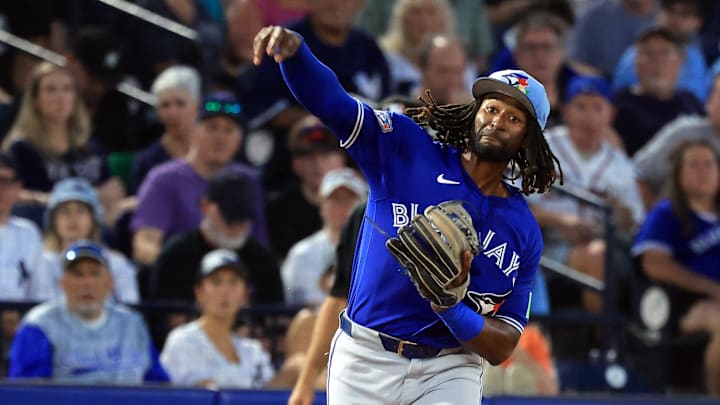Mar 11, 2026; Tampa, Florida, USA;  Toronto Blue Jays infielder Charles McAdoo (26) throws the ball to first base for an out during the fourth inning against the New York Yankees at George M. Steinbrenner Field. Mandatory Credit: Kim Klement Neitzel-Imagn Images