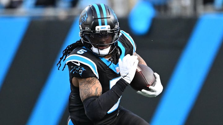 Dec 21, 2025; Charlotte, North Carolina, USA; Carolina Panthers running back Rico Dowdle (5) with the ball in the fourth quarter at Bank of America Stadium. Mandatory Credit: Bob Donnan-Imagn Images Dec 21, 2025; Charlotte, North Carolina, USA; Carolina Panthers running back Rico Dowdle (5) with the ball in the fourth quarter at Bank of America Stadium. Mandatory Credit: Bob Donnan-Imagn Images
