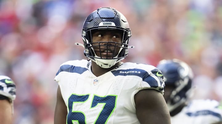 Dec 8, 2024; Glendale, Arizona, USA; Seattle Seahawks offensive tackle Charles Cross (67) against the Arizona Cardinals at State Farm Stadium. Mandatory Credit: Mark J. Rebilas-Imagn Images Dec 8, 2024; Glendale, Arizona, USA; Seattle Seahawks offensive tackle Charles Cross (67) against the Arizona Cardinals at State Farm Stadium. Mandatory Credit: Mark J. Rebilas-Imagn Images