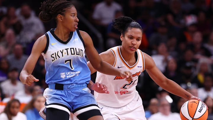Aug 28, 2025; Phoenix, Arizona, USA; Chicago Sky guard Ariel Atkins (7) against Phoenix Mercury forward Alyssa Thomas (25) at Phx Arena. Mandatory Credit: Mark J. Rebilas-Imagn Images