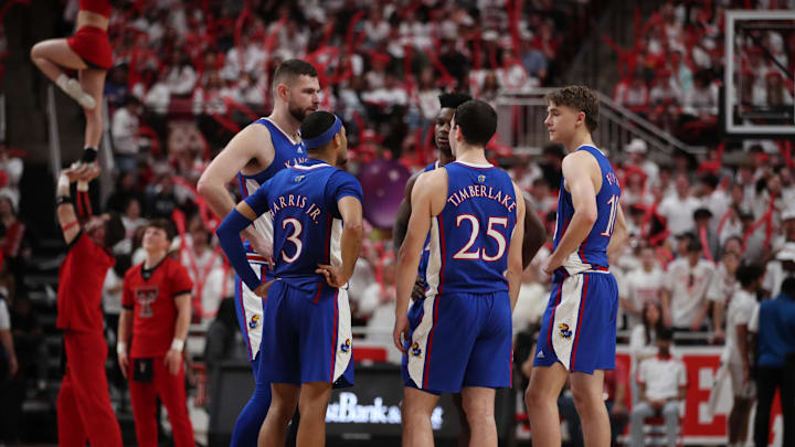 Feb 12, 2024; Lubbock, Texas, USA;  Kansas Jayhawks center Hunter Dickinson (1), in the second half along with forward KJ Adams Jr. (5), guard Johnny Furphy (10), guard Nicolas Timberlake (25) and guard Dajuan Harris Jr (3) in the game against the Texas Tech Red Raiders at United Supermarkets Arena. Mandatory Credit: Michael C. Johnson-Imagn Images