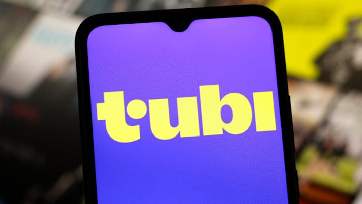 In this photo illustration, the Tubi logo is seen displayed...