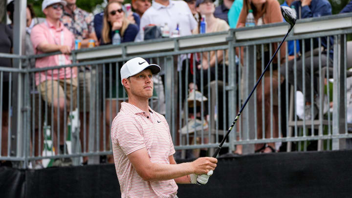 Cam Davis tees off during the final round of the 2024 Rocket Mortgage Classic.
