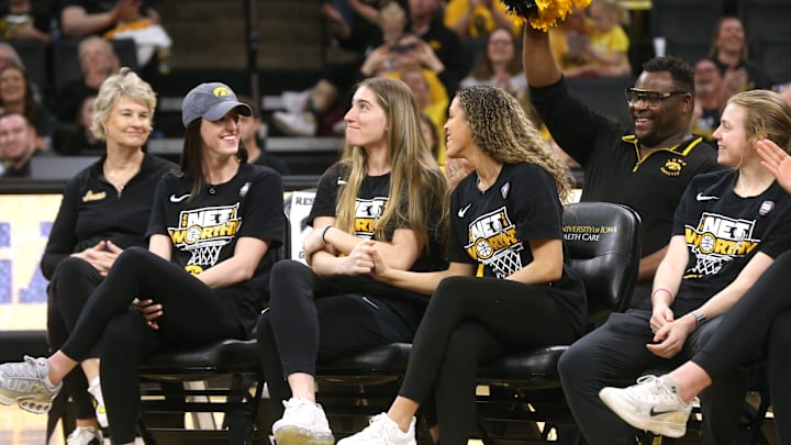 Iowa’s Caitlin Clark, left, Kate Martin, center, and Gabbie Marshall react during a celebration of the Iowa women’s basketball team Wednesday, April 10, 2024 at Carver-Hawkeye Arena in Iowa City, Iowa.
