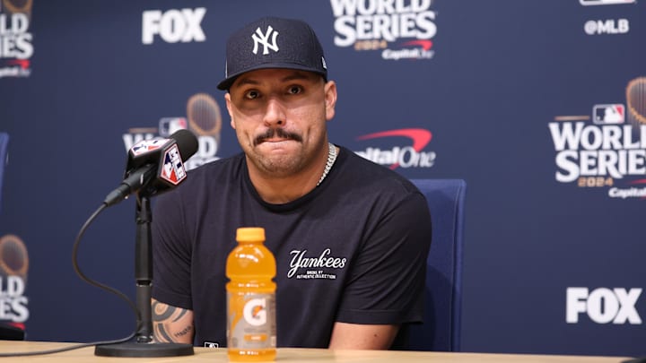 Oct 25, 2024; Los Angeles, California, USA; New York Yankees pitcher Nestor Cortes Jr (65) talks to the media prior to the game against the Los Angeles Dodgers during game one of the 2024 MLB World Series at Dodger Stadium. Mandatory Credit:  Kiyoshi Mio-Imagn Images