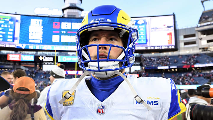 Nov 17, 2024; Foxborough, Massachusetts, USA; Los Angeles Rams quarterback Matthew Stafford (9) walks off of the field after a game against the New England Patriots at Gillette Stadium. Mandatory Credit: Brian Fluharty-Imagn Images