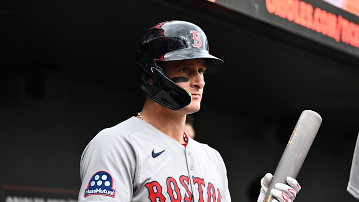 Aug 26, 2025; Baltimore, Maryland, USA; Boston Red Sox outfielder Roman Anthony (19) stands in the dugout before the game between the Baltimore Orioles and the Boston Red Sox at Oriole Park at Camden Yards. Mandatory Credit: James A. Pittman-Imagn Images