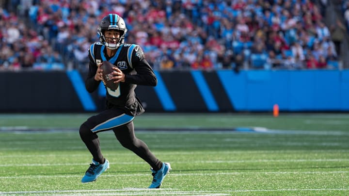 CHARLOTTE, NORTH CAROLINA - NOVEMBER 24: Bryce Young #9 of the Carolina Panthers rolls out against the Kansas City Chiefs during the game at Bank of America Stadium on November 24, 2024 in Charlotte, North Carolina.