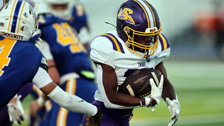 Sanger running back Reggie Jones ecliped the 2,000-yard mark during a 91-56 win against Farmersville on Nov. 6. 