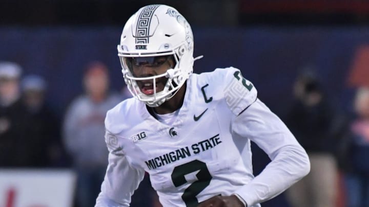 Nov 16, 2024; Champaign, Illinois, USA;  Michigan State Spartans quarterback Aidan Chiles (2) during the second half against the Illinois Fighting Illini  at Memorial Stadium. Mandatory Credit: Ron Johnson-Imagn Images