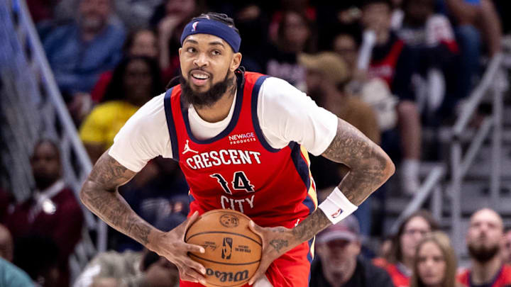 Oct 23, 2024; New Orleans, Louisiana, USA;  New Orleans Pelicans forward Brandon Ingram (14) passes the ball across court against the Chicago Bulls during the second half at Smoothie King Center.