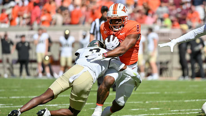 Oct 4, 2025; Blacksburg, Va.; Wake Forest defensive back Karon Prunty (3) tackles Virginia Tech running back Terion Stewart (8).