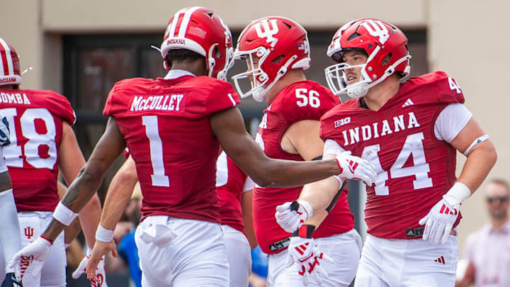 Indiana tight end Zach Horton (44) celebrates a touchdown with Donaven McCulley (1) against Florida International at Memorial Stadium.