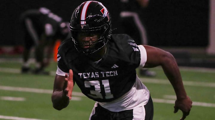 Stanford transfer David Bailey goes through a drill during Texas Tech's spring football practice, Tuesday, April 8, 2025, at the Womble Football Center.