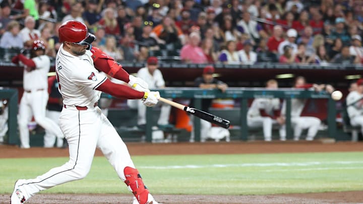 Arizona Diamondbacks first base Christian Walker (53) hits a single to drive in a run on Sept. 15, 2024, at Chase Field in Phoenix.